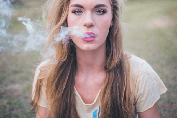 young adult girl smoking marijuana